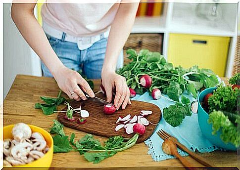 Preparing meals at home with children helps them learn to eat healthy.