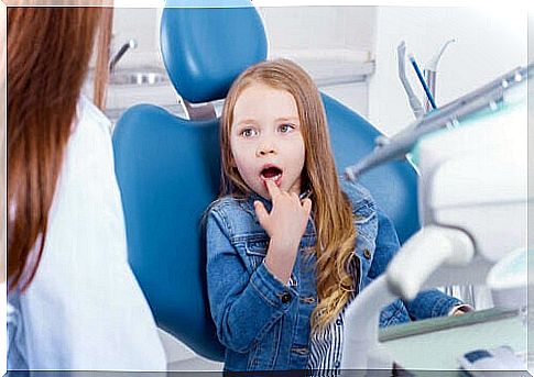 A child at the dentist for tooth sensitivity.