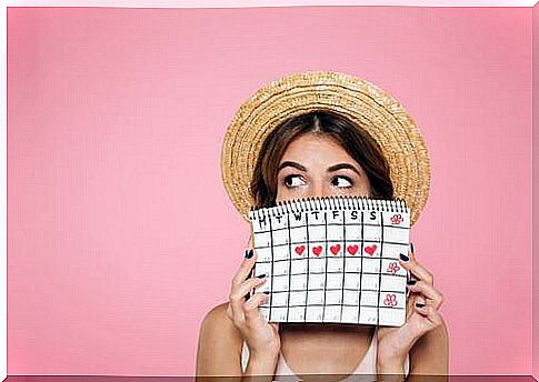 A woman with her menstruation calendar