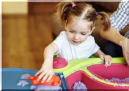 A little girl playing.