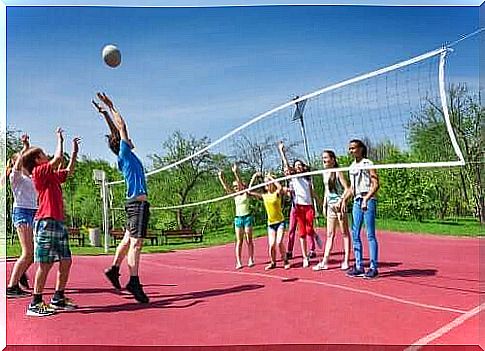 children playing volleyball