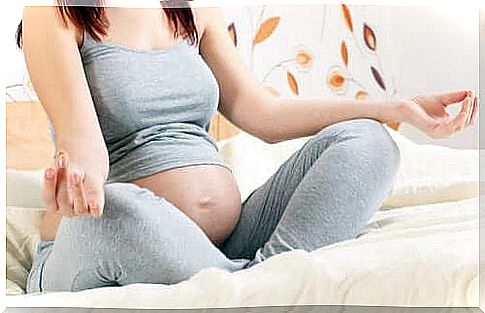 Pregnant woman doing relaxation