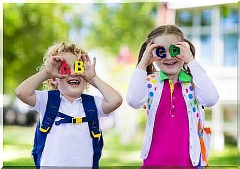 brother and sister playing together at school 