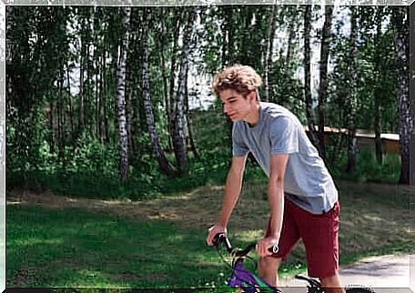 A teenager who rides a bicycle. 