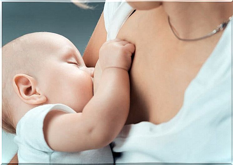 Baby breastfeeding scene