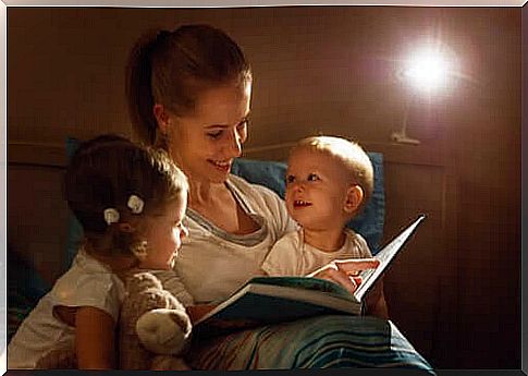 mother reading to her children